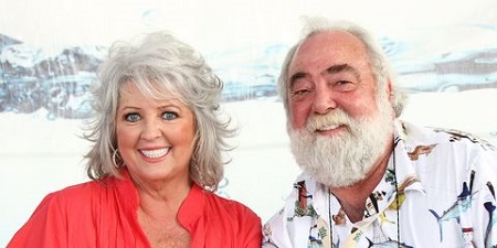 Paula posing with her husband Michael